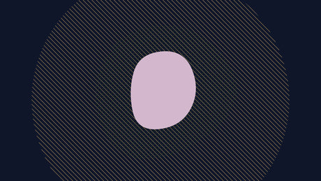 Pink geometric moon wallpaper in a modern living room with grey sofa and golden accents showing perfect harmony
