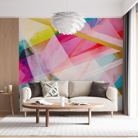 Geometric abstract rainbow wallpaper creating a stunning focal point in a modern living room with clean furniture