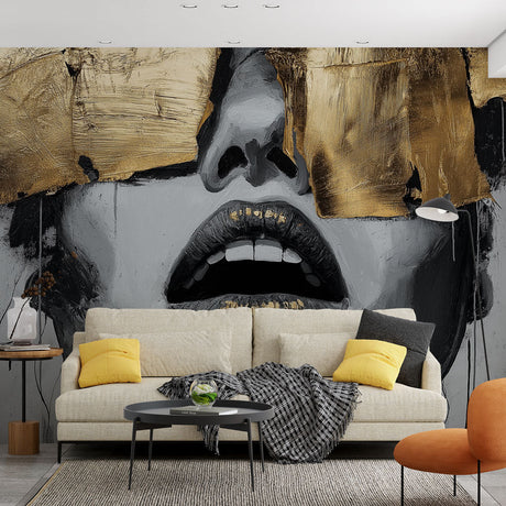 Abstract face mural with gold accents creating drama in a modern living room with high ceilings and minimal furniture