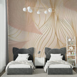 Pink and gold abstract wallpaper design showcased in a modern home office