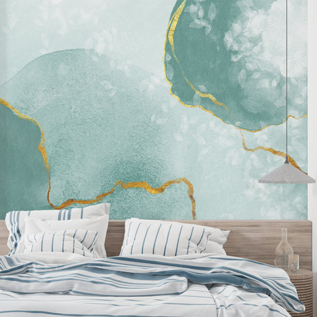 Modern living room with mint green and gold abstract wallpaper creating a fresh, airy atmosphere