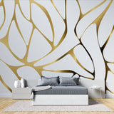 Gold geometric pattern wallpaper in dining room showcasing evening lighting effects