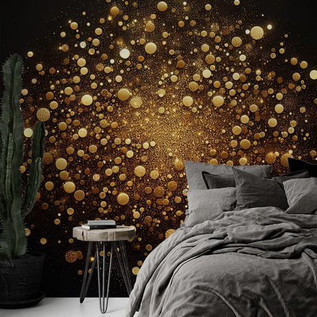 Black and gold abstract wallpaper creating dramatic impact in modern living room with floating golden spheres catching light