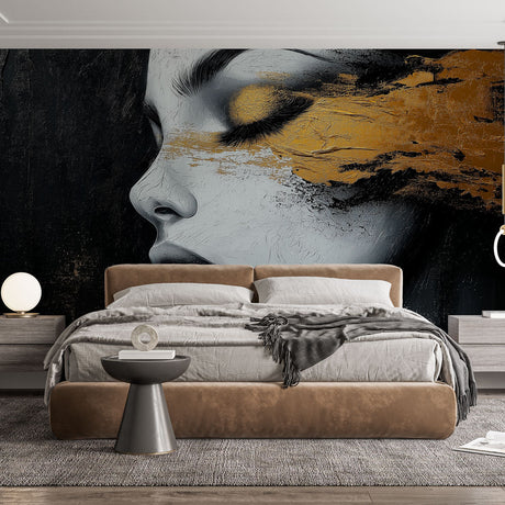 Abstract portrait art mural with gold accents styled in a modern living room, creating a dramatic focal point above a gray sofa