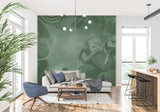 Emerald green marble wallpaper featured in dining room, gold details catching evening light
