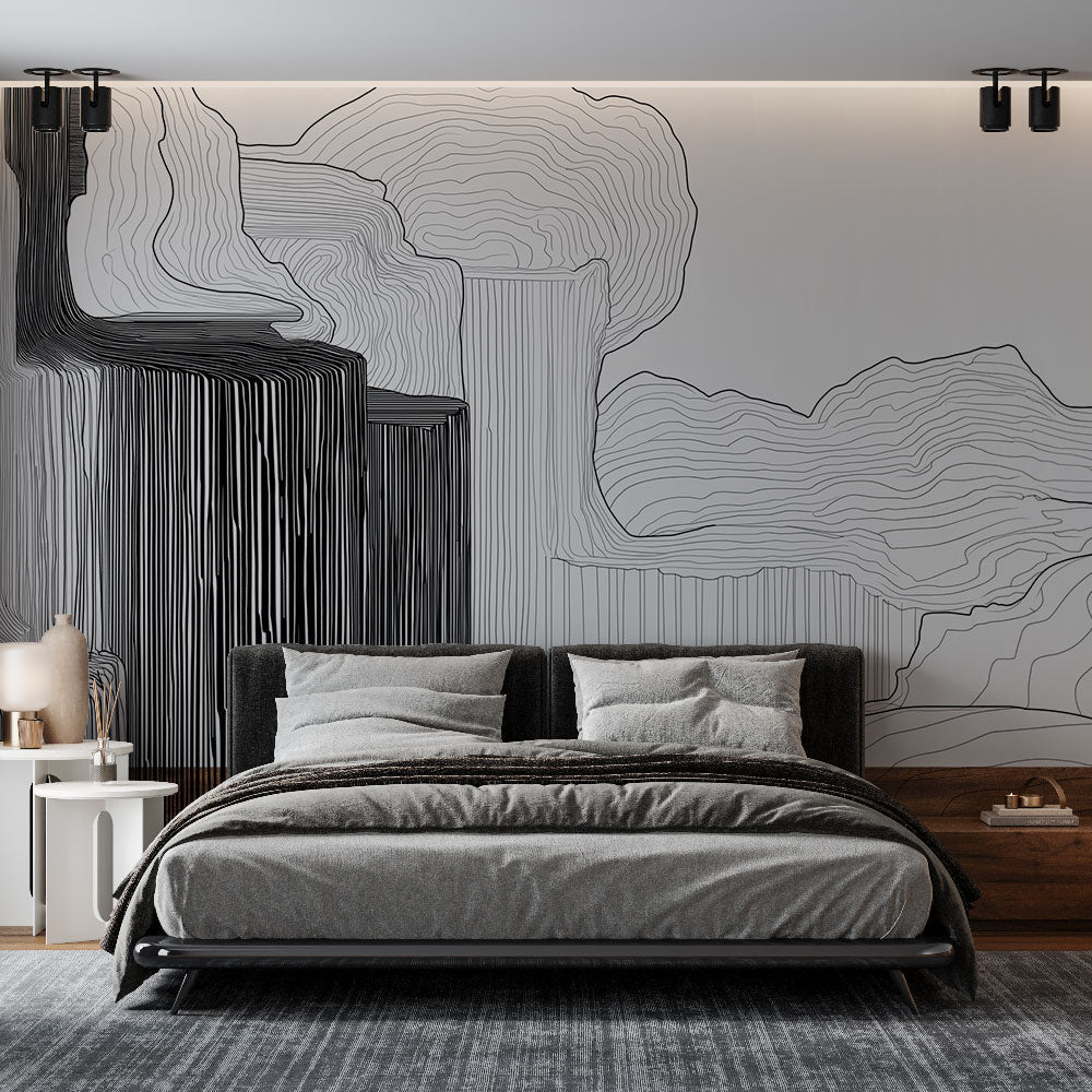 Modern abstract wave wallpaper creating dramatic effect in a minimalist living room with natural lighting