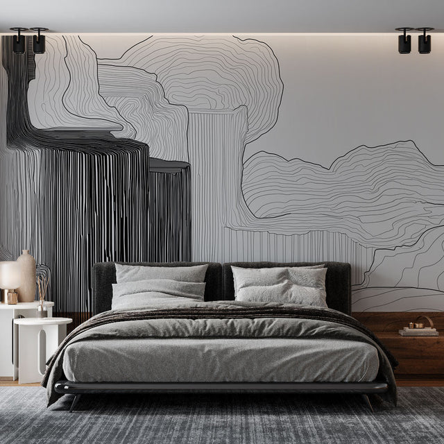 Modern abstract wave wallpaper creating dramatic effect in a minimalist living room with natural lighting
