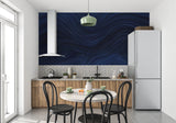 Abstract blue wallpaper pattern bringing movement to a stylish entrance hall