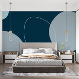 Modern geometric circle wallpaper in a minimalist living room setting with contemporary furniture and natural lighting
