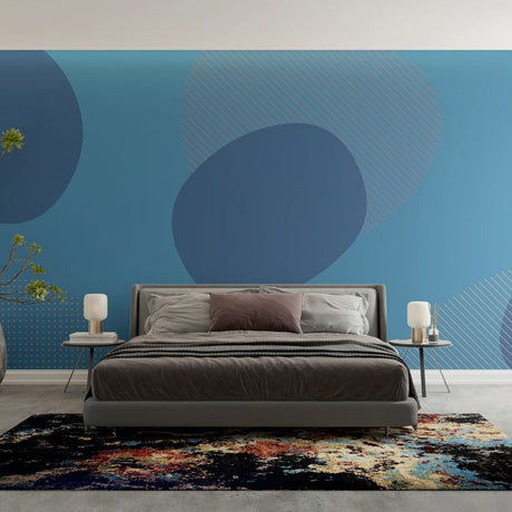 Modern blue geometric wallpaper mural showcased in a minimalist living room with natural light