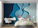 Abstract blue wave mural adding movement to a contemporary bedroom wall
