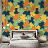 Modern abstract wallpaper pattern showcased in a bright, contemporary living room with minimalist furniture