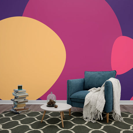 Modern purple and pink circular wallpaper design styled in a bright contemporary living room with minimal furniture