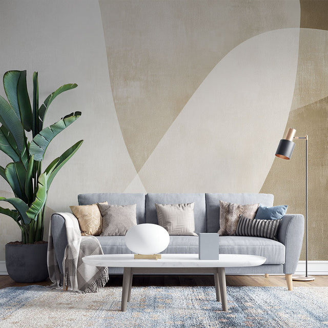 Modern abstract curved shapes wallpaper in beige tones creating a calm atmosphere in a minimalist living room setting