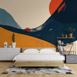 Modern abstract desert wallpaper creating a stunning focal point in a minimalist living room with clean furniture lines