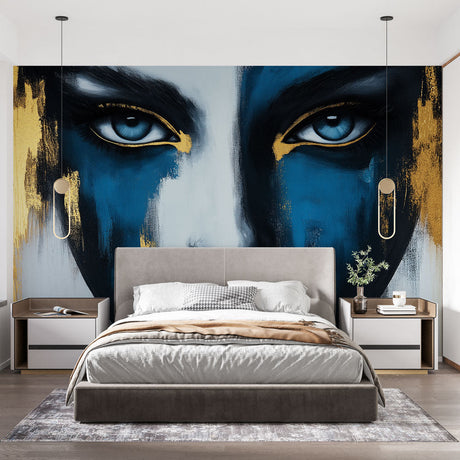 Modern abstract face wallpaper with blue and gold tones creating dramatic impact in a minimalist living room setting