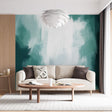 Modern green abstract wallpaper mural styled in bright contemporary living room with minimal furniture
