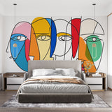 Modern abstract face wallpaper showcased in a bright living room, creating a bold artistic statement wall