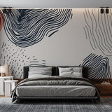 Modern abstract wave wallpaper creating a stunning focal point in a minimalist living room with natural lighting
