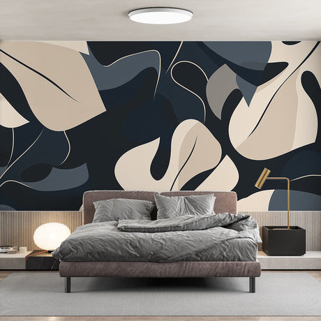 Modern Monstera leaf wallpaper creating a stylish accent wall in a bright, contemporary living room with minimal furniture