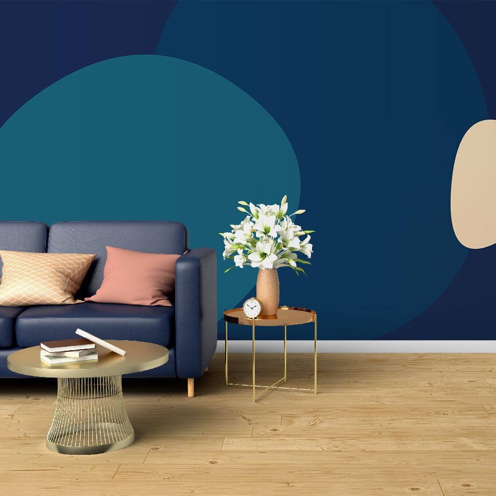 Modern abstract circle wallpaper in navy and teal creating a peaceful atmosphere in a minimalist living room