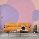 Modern Pastel Circle Wallpaper in bright living room showing floating geometric shapes against soft peach backdrop