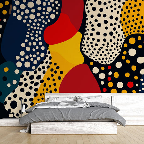 Modern abstract polka dot wallpaper bringing life to a bright living room with navy and red accents
