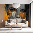 Modern abstract portrait wallpaper in orange and grey tones creating dramatic impact in a minimalist living room setting