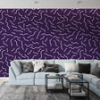 Modern purple wave pattern wallpaper showcased in a minimalist living room with contemporary furniture