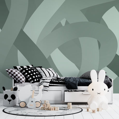 Modern geometric wallpaper in sage green showcased in a minimalist living room with natural light