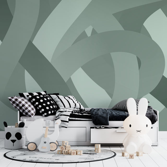 Modern geometric wallpaper in sage green showcased in a minimalist living room with natural light