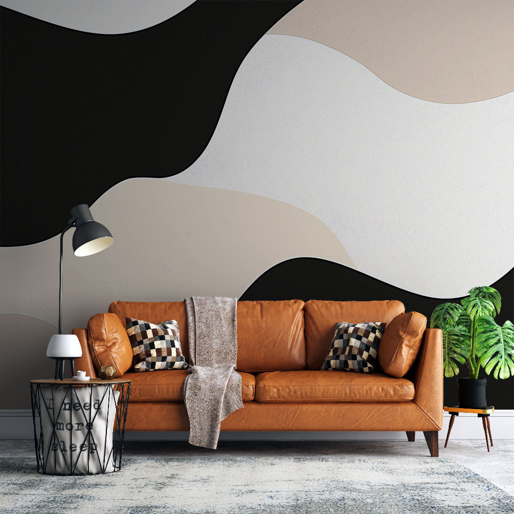 Modern wave wallpaper in a minimalist living room, showing black and beige abstract pattern creating depth on feature wall