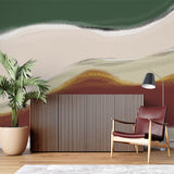 Modern wave wallpaper in green and terracotta adding flow to a minimal living room