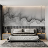 Monochrome watercolor wall mural creating depth in a master bedroom with morning light