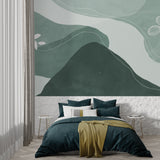 Bedroom with soft green Mountain Curves Wallpaper creating a zen space