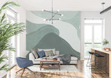 Dining room transformed by Abstract Mountain Wallpaper in calming sage tones