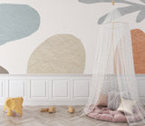Abstract wall mural with organic curves bringing flow to a home office