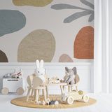 Curved shapes and clouds wallpaper creating depth in a modern bedroom