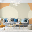 Abstract circle wallpaper creating a warm, modern atmosphere in a minimalist living room with beige and orange tones