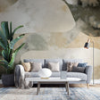 Abstract curved wallpaper in beige and grey tones creating a peaceful atmosphere in a modern living room setting