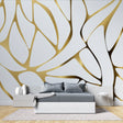 Modern living room with abstract gold line wallpaper creating an elegant backdrop for grey sofa and contemporary furniture