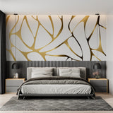 Dining room featuring organic gold line wallpaper that catches light beautifully during daytime meals