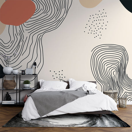 Abstract line art wallpaper creating a modern focal point in a minimalist living room with terracotta and cream accents