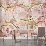 Abstract pink and gold wall mural brightening a contemporary dining space