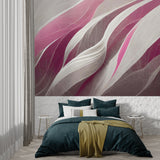 Abstract wave mural in pink and grey tones styled in contemporary bedroom