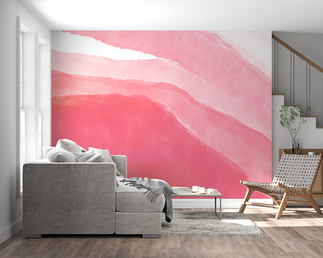 Pink watercolor wave wallpaper in bright modern living room with minimal furniture