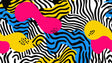 Abstract zebra pattern wallpaper creating a bold statement in a modern home office with white furniture