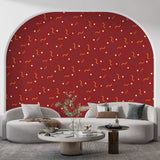 Modern red geometric wallpaper creating a bold statement wall in a contemporary living room with natural lighting