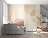 Abstract beige wallpaper in home office with wooden desk and plants