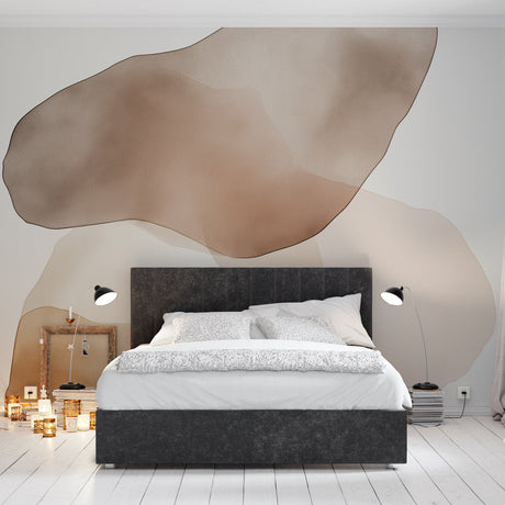 Abstract beige watercolor wallpaper creating a serene atmosphere in a modern living room with minimal furniture